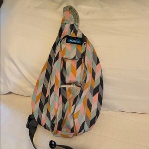 Kavu Geometric Chevron Sling Bag in Pink, Teal, Yellow, Black
